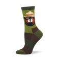 Crew sock with a Smokey Bear portrait on ribbed olive-green. Lower sock has dark green and brown checkerboard pattern.