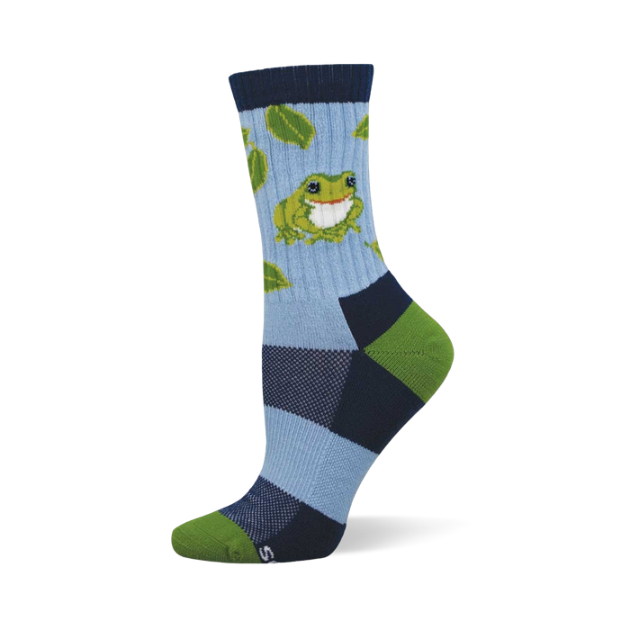 Crew sock with light blue leg, green frog, green leaves. Dark blue cuff, heel, and toe with light blue and lime green color blocks. }}