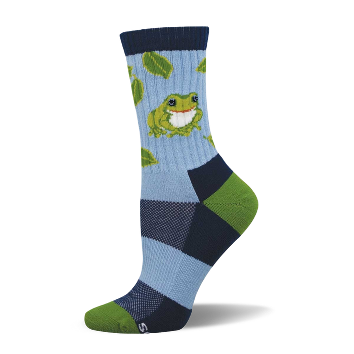 Crew sock with light blue leg, green frog, green leaves. Dark blue cuff, heel, and toe with light blue and lime green color blocks. }}