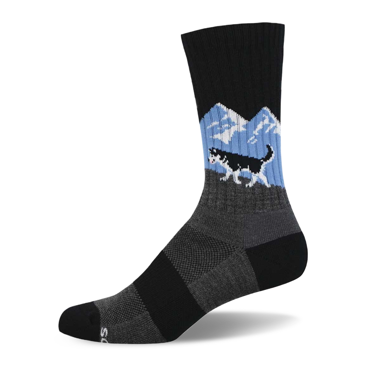 A single black crew sock featuring a black and white husky running over a grey hill with blue sky and white mountains.