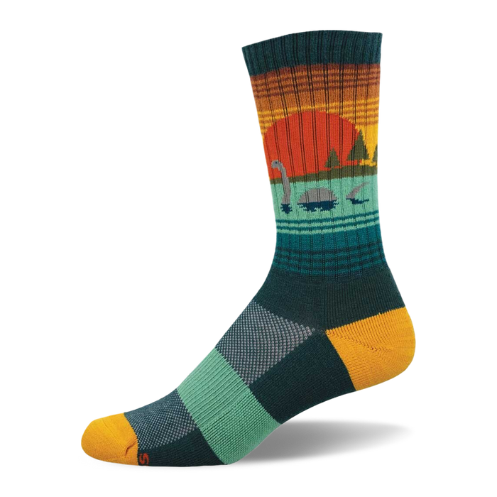 Crew sock with a sunset and Loch Ness Monster design. Orange sun, teal water, dark green trees, yellow heel/toe, checkered foot. }}