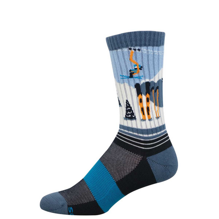 Crew sock with a ski slope design. Features a blue sky, white snow, orange ski lift, skier, black pine trees, and orange skis. Dark blue foot. }}