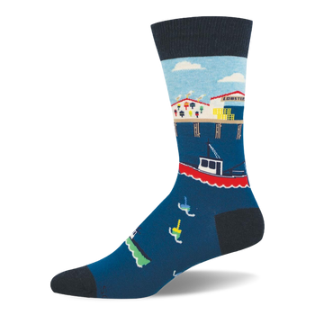 Crew sock featuring a coastal fishing pier over dark blue water with a lobster shack, a red fishing boat, and floating buoys.