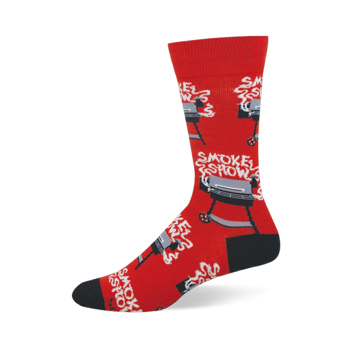Bright red crew socks featuring black and grey barrel grills with white smoke rising up to spell the words Smoke Show.