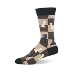 Crew sock with a brown and tan checkerboard pattern featuring white and black chess pieces like knights, pawns, and bishops.