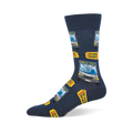 Navy blue crew socks featuring a pattern of grey buses reading POUND TOWN and yellow ONE WAY tickets.