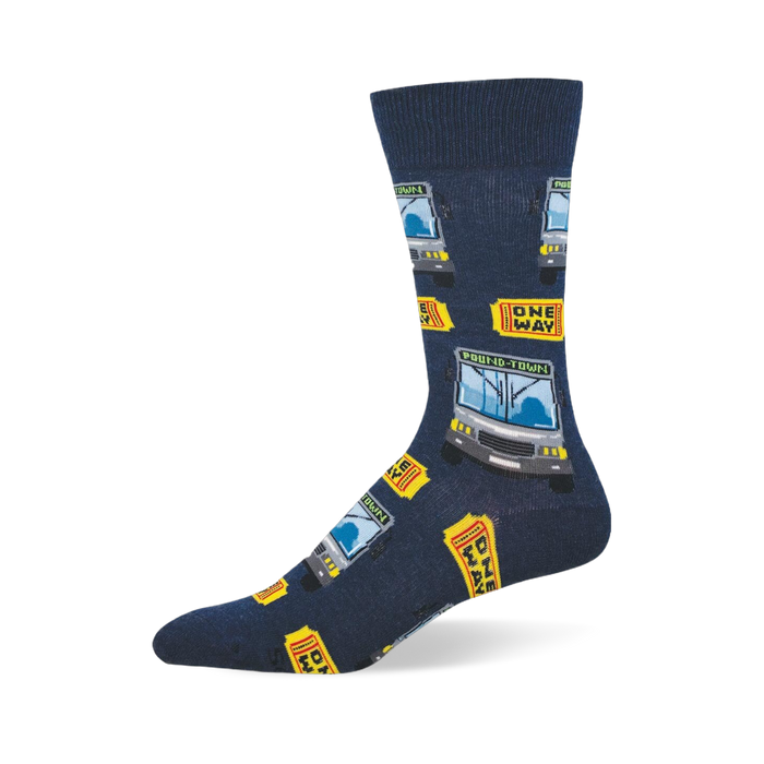 Navy blue crew socks featuring a pattern of grey buses reading POUND TOWN and yellow ONE WAY tickets. }}
