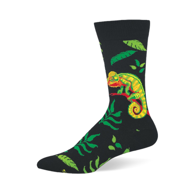 Black crew socks featuring a neon green and yellow chameleon on a red branch, surrounded by assorted green jungle leaves.