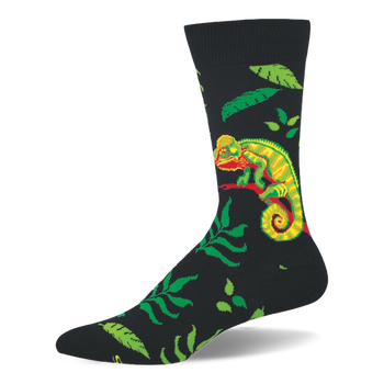 Black crew socks featuring a neon green and yellow chameleon on a red branch, surrounded by assorted green jungle leaves.