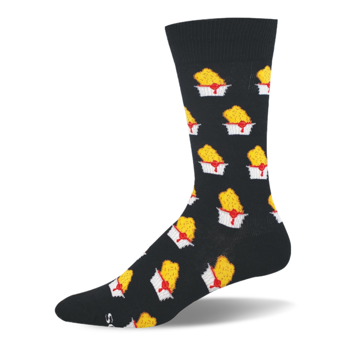 Black crew sock featuring a repeating pattern of golden yellow chicken nuggets being dipped into white cups of red sauce. }}