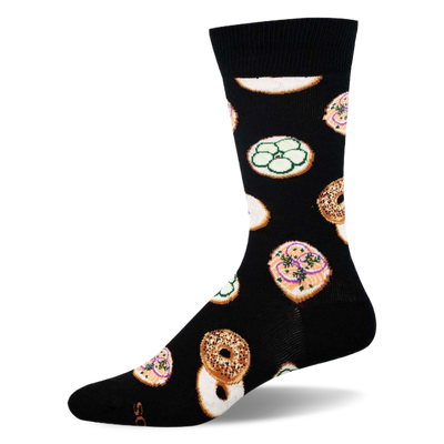 Black crew sock featuring a pattern of everything bagels, plain halves, and bagels topped with cream cheese and cucumbers.