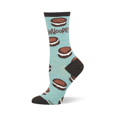 Light blue crew sock showing a pattern of chocolate whoopie pies with white filling, brown accents, and the word WHOOPIE!