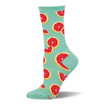 Light mint green crew sock featuring a bright pattern of red grapefruit slices and wedged halves with yellow rinds.
