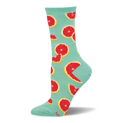 Light mint green crew sock featuring a bright pattern of red grapefruit slices and wedged halves with yellow rinds.
