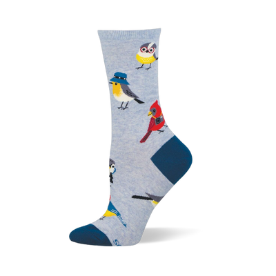 Light blue crew sock with navy heel and toe, featuring a pattern of quirky birds wearing glasses, bucket hats, and cameras.