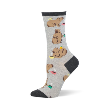 Grey crew sock featuring relaxed capybaras drinking from colorful steaming coffee mugs, with dark charcoal cuff and toe.