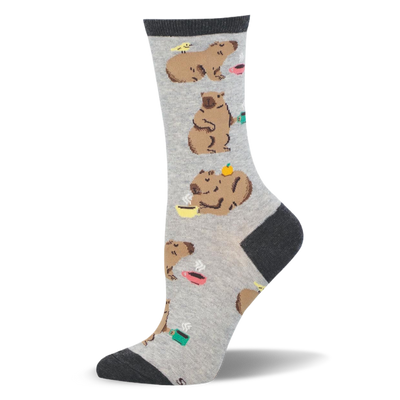Grey crew sock featuring relaxed capybaras drinking from colorful steaming coffee mugs, with dark charcoal cuff and toe.