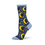 Dark blue crew sock featuring black cats sitting on yellow crescent moons with stars. Finished with light blue cuff and toe.