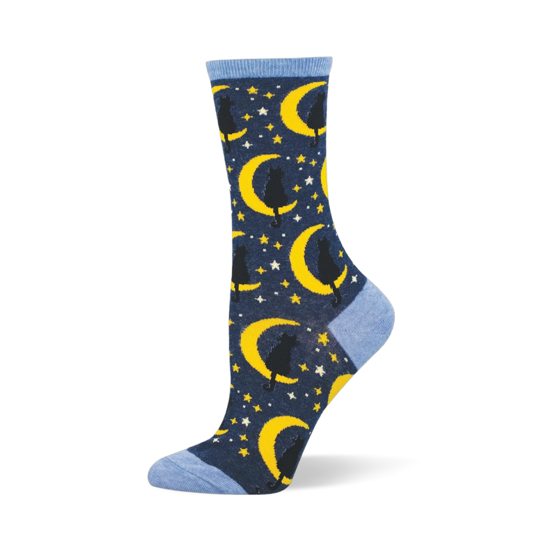 Dark blue crew sock featuring black cats sitting on yellow crescent moons with stars. Finished with light blue cuff and toe.