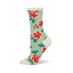 Mint green crew socks covered in red and orange hibiscus flowers with dark green leaves. The cuff and heel are cream colored.