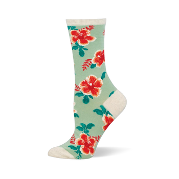 Mint green crew socks covered in red and orange hibiscus flowers with dark green leaves. The cuff and heel are cream colored.