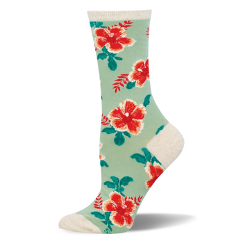 Mint green crew socks covered in red and orange hibiscus flowers with dark green leaves. The cuff and heel are cream colored.