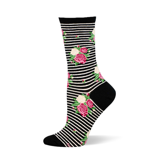 Crew sock with black and white horizontal stripes covered in pink and cream rose clusters. Solid black toe, heel, and cuff.