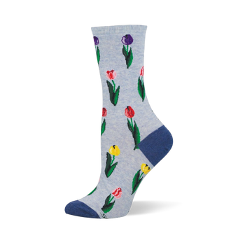 Light blue crew socks featuring a retro pattern of scattered tulips in purple, pink, red, and yellow with a dark blue heel.
