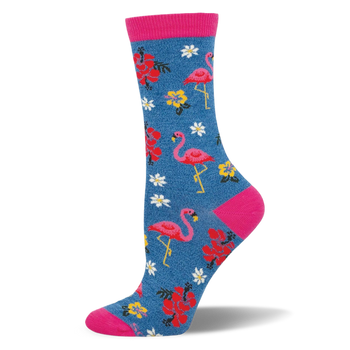 Blue crew socks featuring pink flamingos, colorful tropical flowers, and bright pink accents at the toe, heel, and cuff.