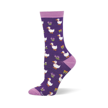 Dark purple bamboo sock showing white ducks in pink bowties mixed with small bright flowers and light purple accents.