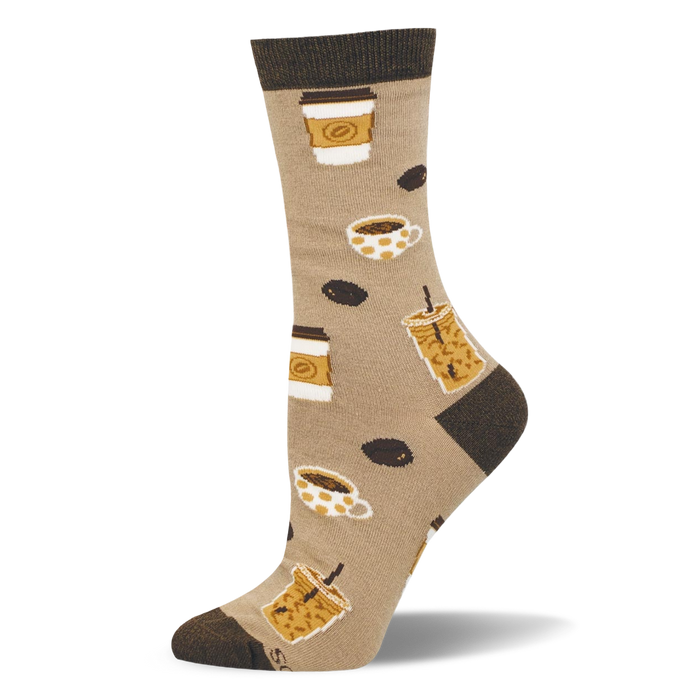 Tan bamboo crew sock with dark brown toe, heel and cuff, featuring a pattern of iced coffees, to-go cups, mugs and beans. }}