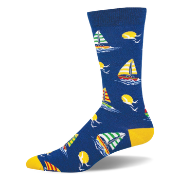 Blue bamboo crew sock featuring colorful striped sailboats, yellow suns, white seagulls, and bright yellow heel and toe.