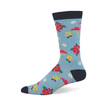 Light blue sock showing a pattern of pink flamingos, red hibiscus, yellow blooms, and white flowers with a dark navy cuff.