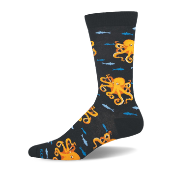 Black crew sock showing bright orange octopuses and blue fish, finished with a black ribbed cuff, heel, toe, and footbed.