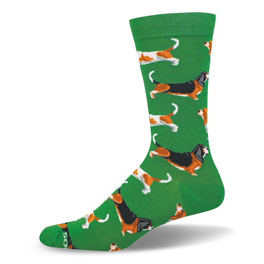 Green crew sock featuring a repeating pattern of long basset hounds in tricolor and brown-and-white coat variations. }}