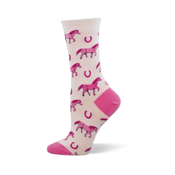 Crew sock with a pale cream background, bright pink pixelated horses, scattered horseshoes, and solid pink heels and toes.