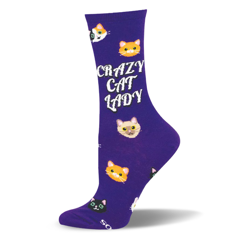 Dark purple crew sock with bold white CRAZY CAT LADY text, surrounded by scattered feline faces like tabby and calico cats.