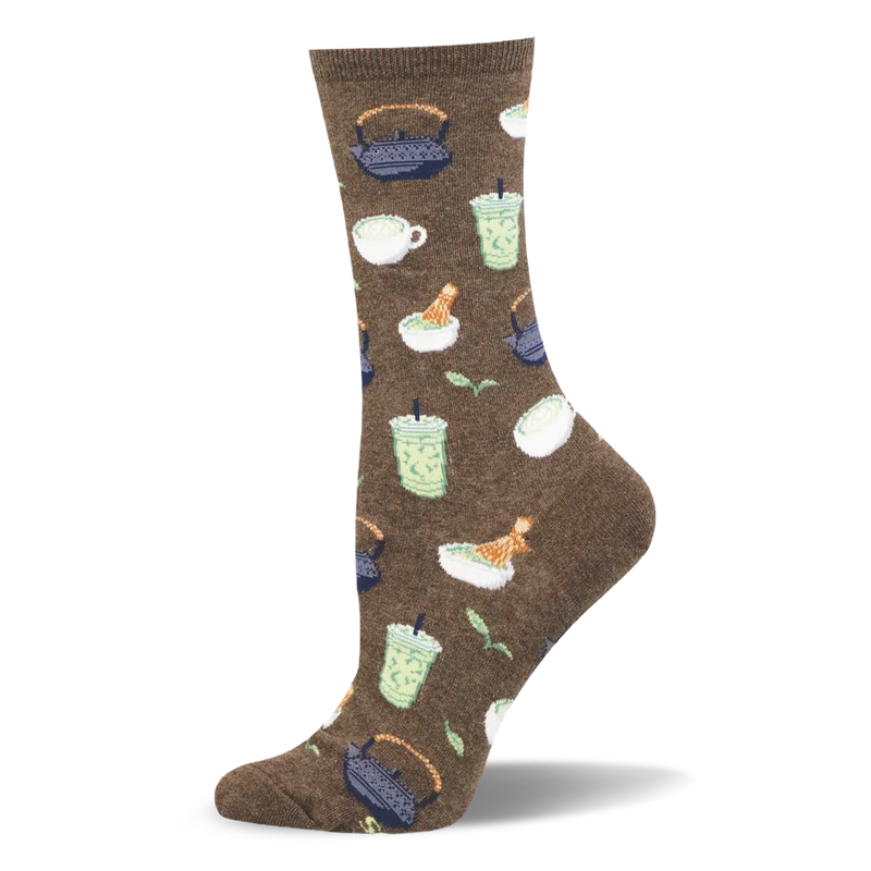 Brown crew sock showing a pattern of iced matcha lattes, cast iron teapots, mugs, bamboo whisks, and green tea leaves.