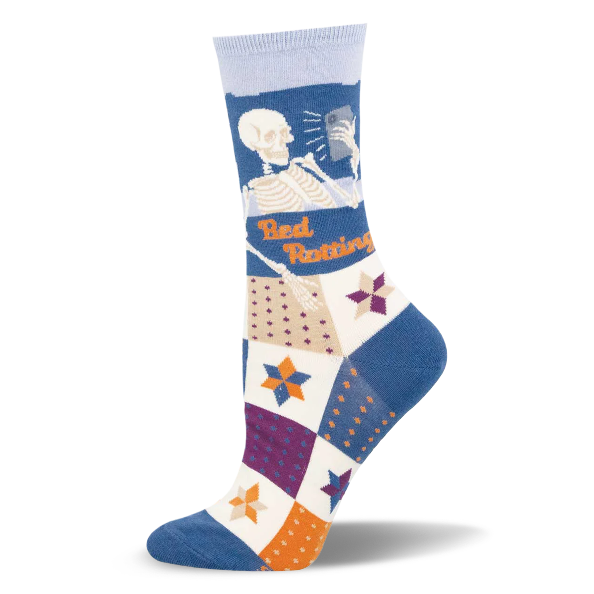 Crew sock with a skeleton looking at a phone and orange Bed Rotting text above a multi-colored patchwork quilt pattern.