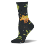 Black sock featuring an orange and green triceratops dinosaur surrounded by green fern leaves and small colored dots.