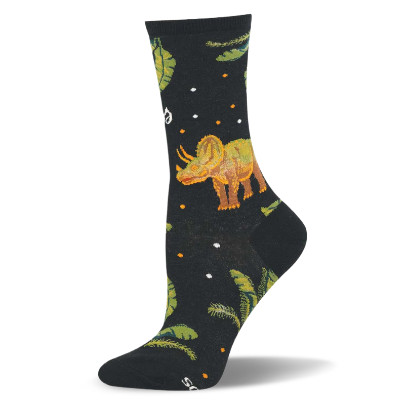 Black sock featuring an orange and green triceratops dinosaur surrounded by green fern leaves and small colored dots.