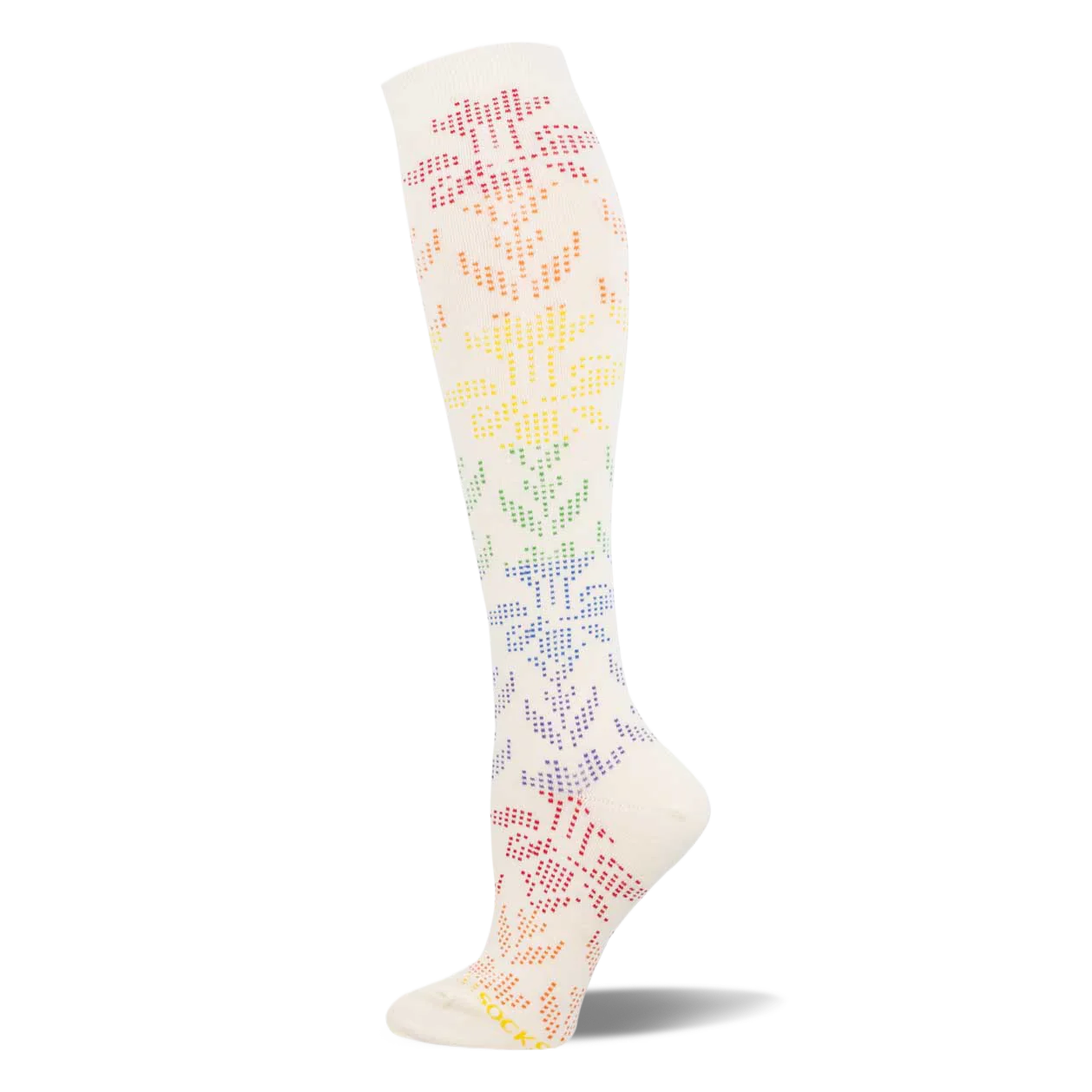 Cream knee-high sock showing a dotted floral lace pattern that shifts through a rainbow gradient from pink down to purple.