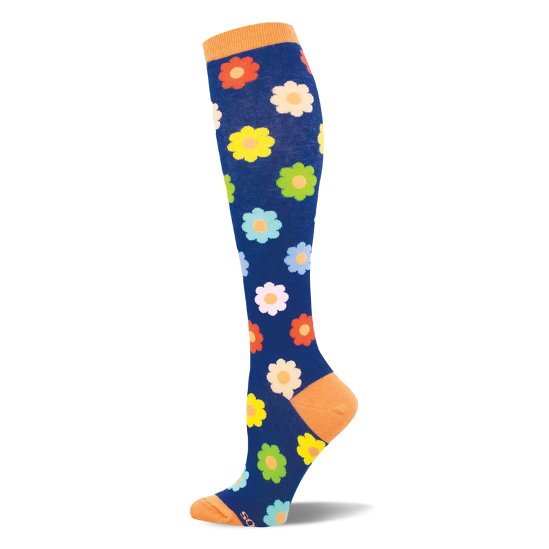 Dark blue knee-high sock with an orange cuff, heel, and toe, covered in a retro pattern of bright, multi-colored daisies.