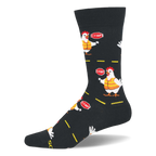 Black socks with a pattern of white chickens wearing orange safety vests and holding stop signs between yellow road lines.