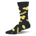 Black crew sock featuring a repeating pattern of whole green pickles and clusters of yellow crinkle-cut pickle slices.