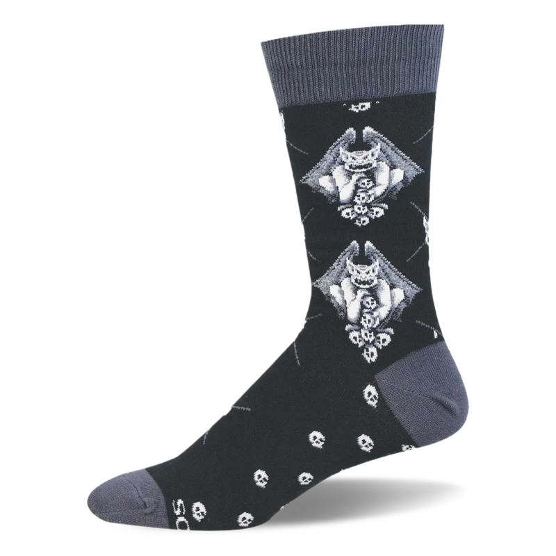 Black crew sock with dark grey heel and toe sections. The pattern features winged gargoyles and scattered little skulls.