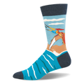 Crew sock showing a colorful flying pteranodon catching a fish over bright blue water and a sandy shore. Navy accents.