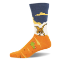 Crew sock with a yellow feathered velociraptor walking on an orange desert landscape with a green cactus under a blue sky.