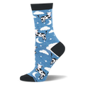 Blue crew sock with black and white cows jumping over crescent moons, fluffy clouds, and stars. Black heel, toe, and cuff.