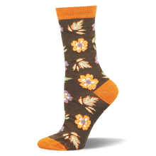 Dark brown crew sock with orange flowers and pale autumn leaves, featuring solid orange accents on the toe and ribbed cuff.